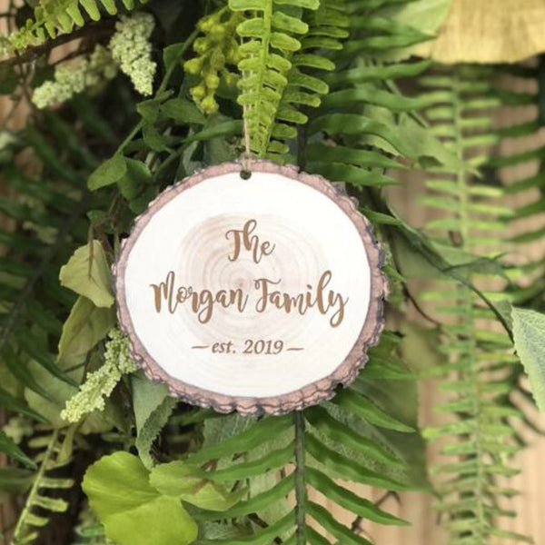 Engraved wood slice ornament.