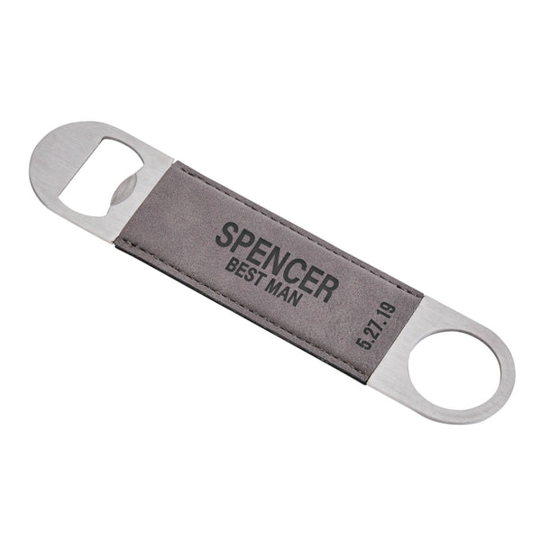 Metal bottle opener with grey leatherette body that is enggraved with a "Best Man" and a name and date in black letters.