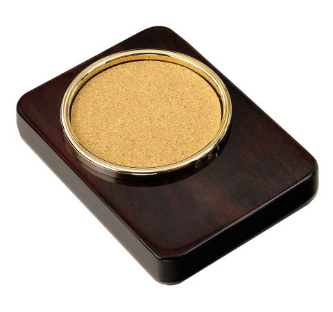 High gloss rosewood rectangular shaped coaster with round cork area to sit your drink. Cork can be engraved with a  monogram. Below the round cork is room for an engraved plate with a special message.