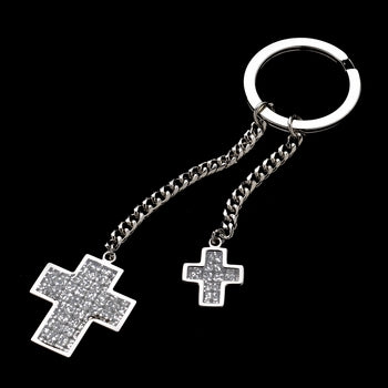 Silver keychain featuring two chains attached to the key ring. One is longer, one is shorter. At the end of each chain hangs a large glitter cross and a small glitter cross.