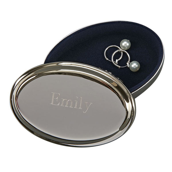 Oval shaped sleek jewelry box with ridge border and lid. The top of the jewelry box is engraved with a name. The inside is blue velvet.