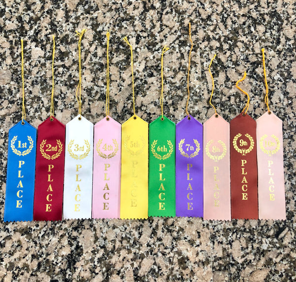 First through tenth place award lapel ribbons for any occasion. Blue, maroon, white, pink, yellow, green, and purple are available with gold foiled writing and wreath design around number.