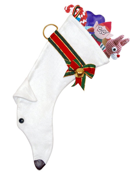 White greyhound breed dog Christmas stocking featuring a floppy ear, a skinny face and a red and green ribbon/collar with a bell attached.