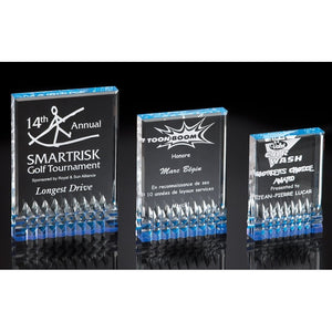 Large, medium, and small engraved rectangle shaped acrylic awards with a diamond design and blue bottom that shines throughout.
