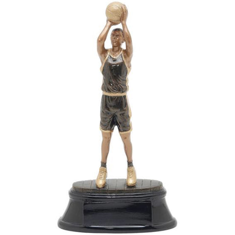 Black and gold basketball trophy featuring an oval shaped base and a basketball player throwing a jump shot.
