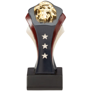 Patriotic trophy featuring a red white and blue small tower with a shiny gold eagle's head on top.