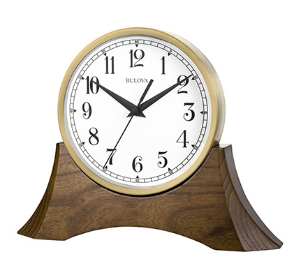 Bulova clock featuring a walnut wood base and a detachable round clock with a white face, and back hands and numbers.