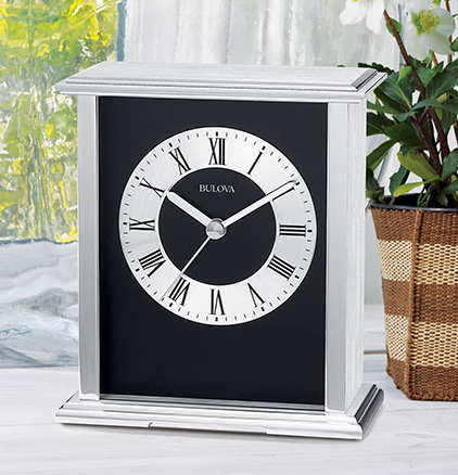 Silver Bulova Baron tabletop clock.