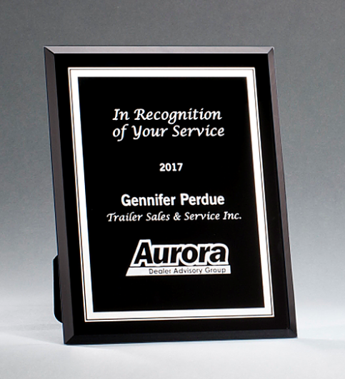 Black and silver personalized glass plaque.