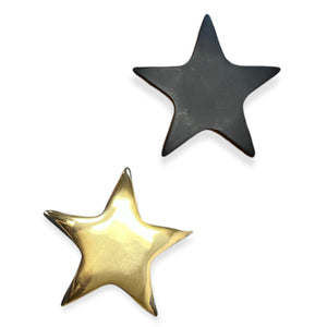 gold and black brass star paperweights