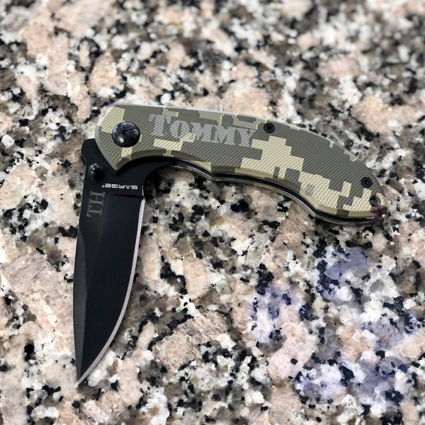 engraved camouflaged knife