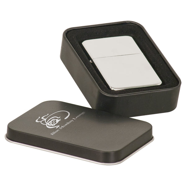 Shiny silver stainless steel lighter in a matte black case with the lid engraved.
