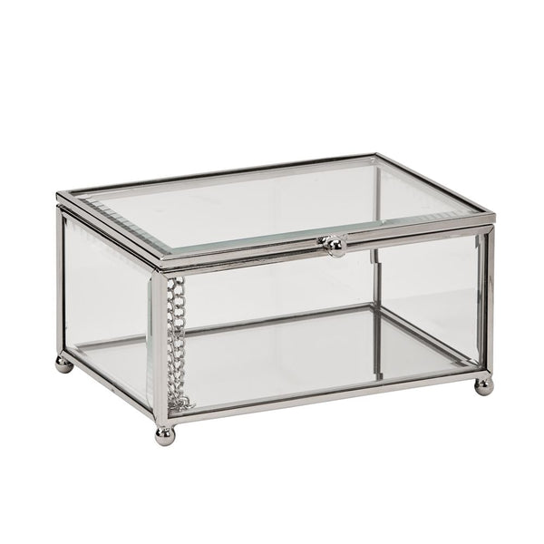 Rectangle shaped glass jewelry box with silver edges and corners and round feet.