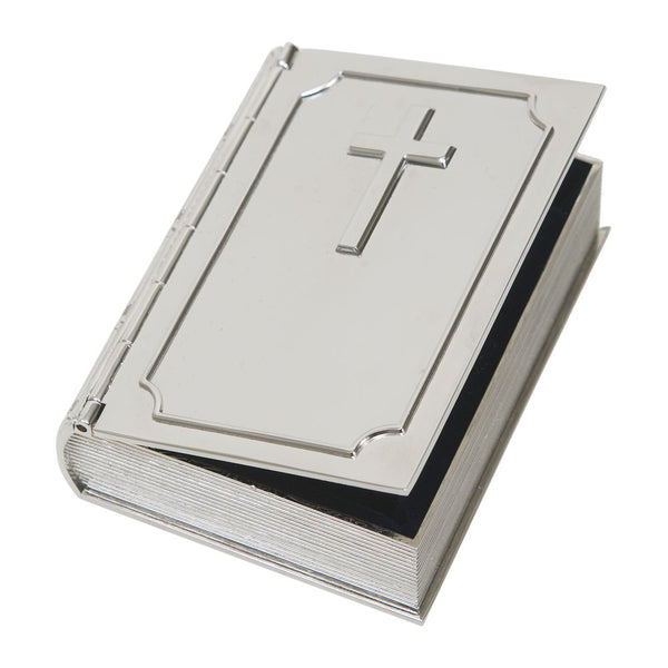 Small silver book shaped keepsake box with a hinged cover. The front of the box features a border, a cross, and a name engraved at the bottom.The edges are designed to look like the spine and pages of a book.