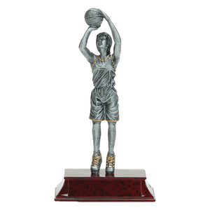 Basketball trophy featuring a silver female basketball player making a jump shot with the basketball raised above his head.