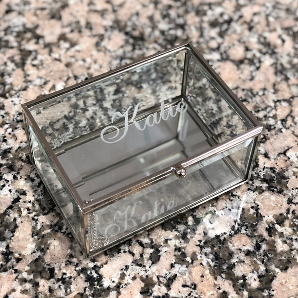 Personalized glass jewelry box with mirror bottom.