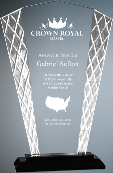 Tall clear glass award that is shaped like a handheld fan. The award sits on a black base. The award is textured with a diamond pattern on the left and right edges and is engraved in a frosty white color.
