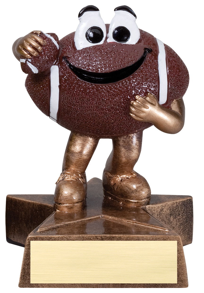 Small football trophy featuring a star shaped base, and a football that has legs, arms and a happy face. He is holding a mini football in one arm.