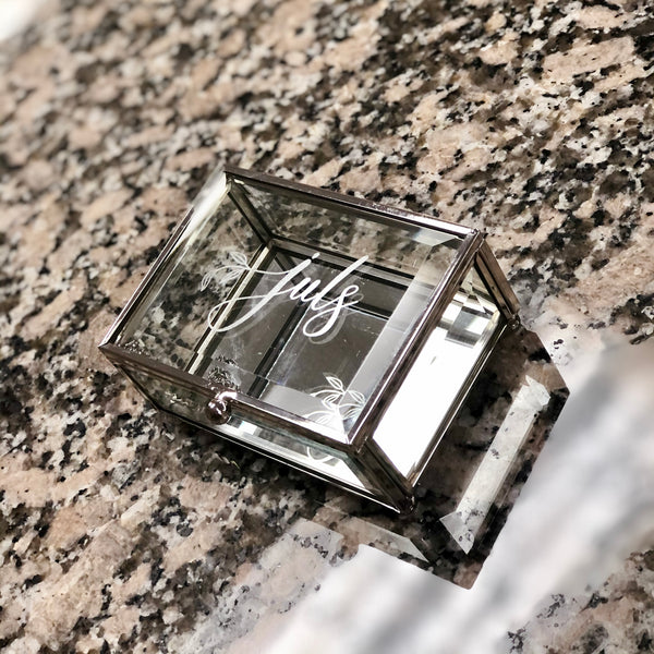 Engraved glass jewelry box.