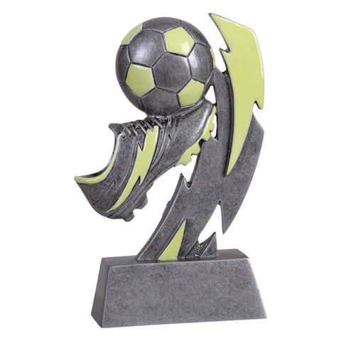 Silver and green glow in the dark soccer trophy featuring a soccer ball, a soccer cleat, and a lightening bolt.
