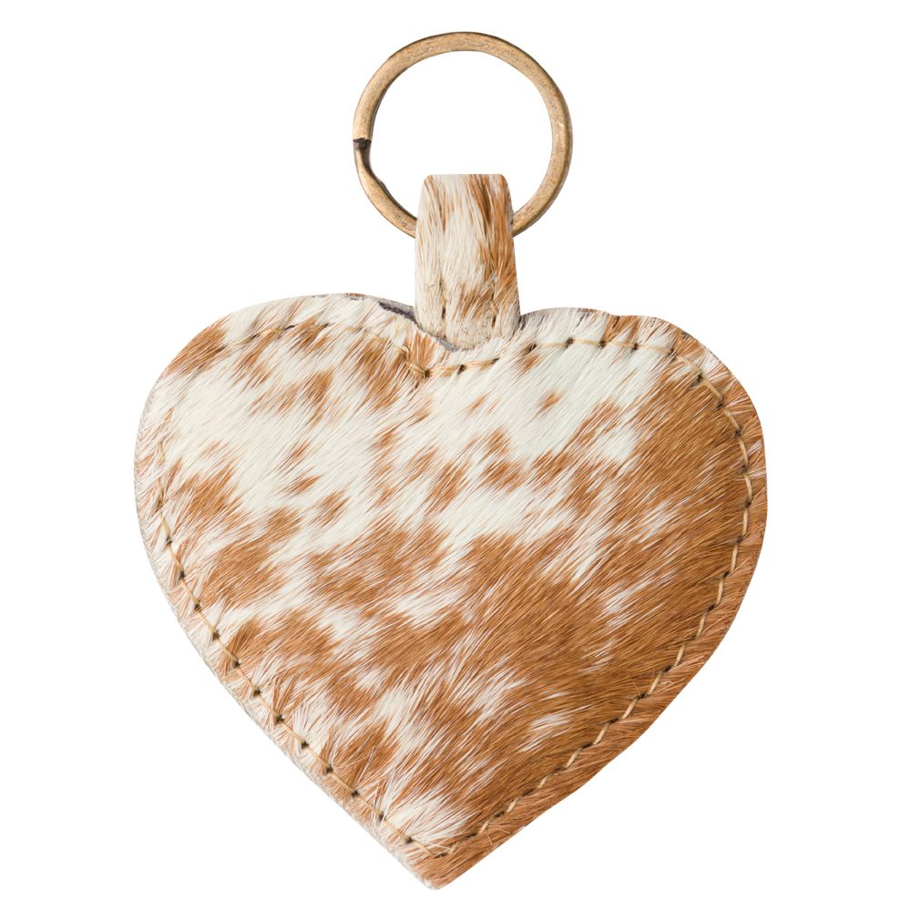 white and brown cowhide keychain