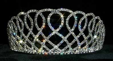 Large rhinestone crown featuring a design that resembles lace.