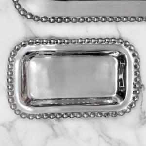 Shiny silver small rectangle shaped tray with a beaded edge. Center of the tray can be engraved with a special message.