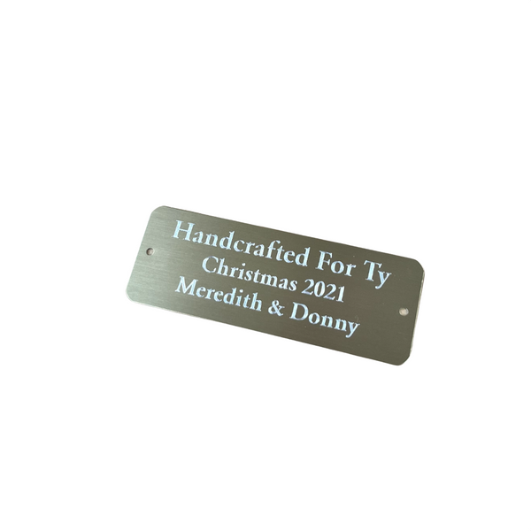 metal engraved plate with holes and rounded corners
