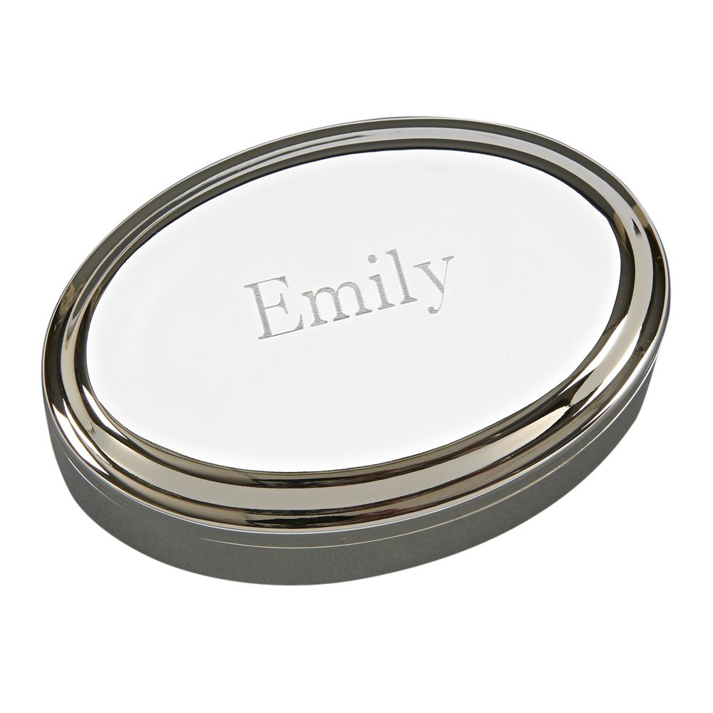 Oval shaped sleek jewelry box with ridge border and lid. The top of the jewelry box is engraved with a name.