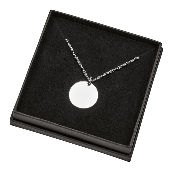 Engraved silver disc pendant necklace.
