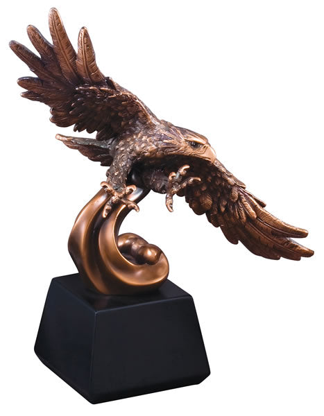 Bronze eagle award featuring a black square base an a bronze soaring eagle with its wings spread wide and talons out.