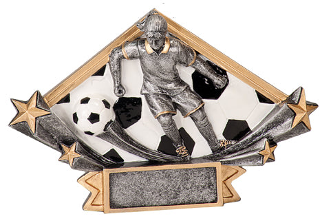 Diamond shaped soccer resin featuring two shooting stars shooting out from the left and right side, and a female soccer player in the middle as if she is running. The background of the diamond shape is a soccer ball pattern.