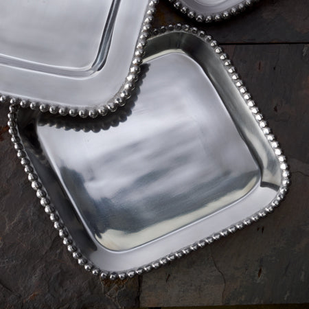 Shiny silver  large square shaped tray with a beaded edge. Center of the tray can be engraved with a special message.