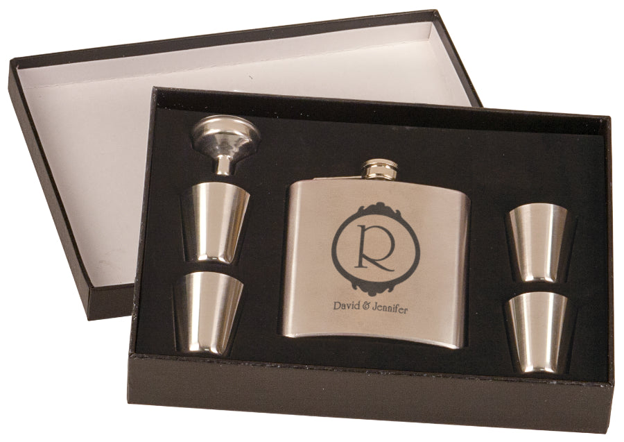 Stainless steel personalized flask set includes four shot glasses and a funnel.