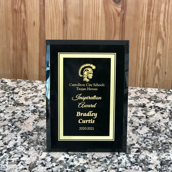 personalized black and gold glass award.