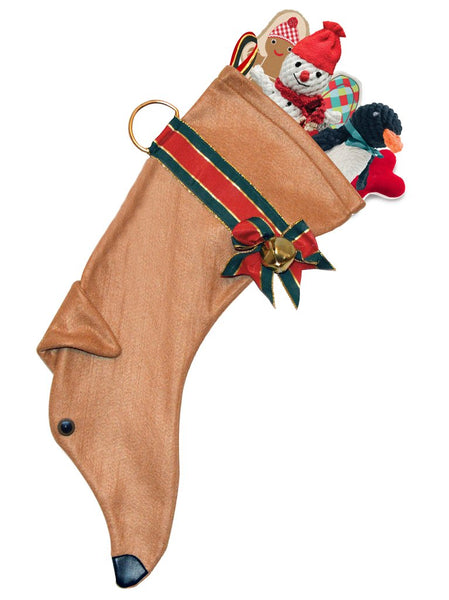 Tan greyhound breed dog Christmas stocking featuring a floppy ear, a skinny face and a red and green ribbon/collar with a bell attached.