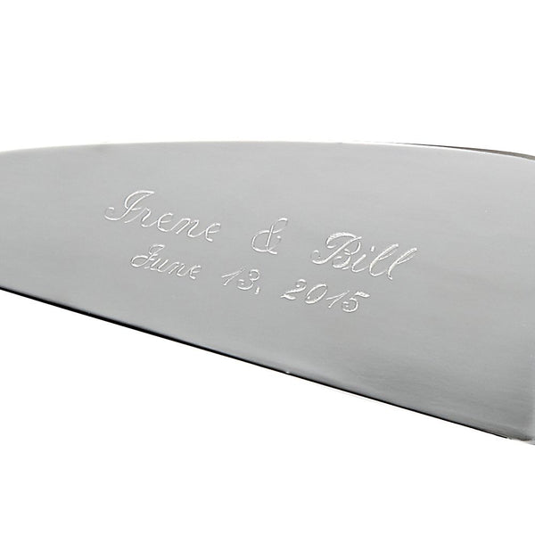 Cake server engraved with a bride and groom's name and anniversary.