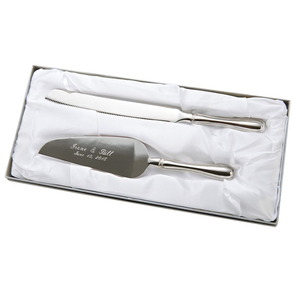Shiny silver metal cake server and knife set featuring  sleek rounded handles. The cake server is engraved with a bride and groom's name and wedding date.
